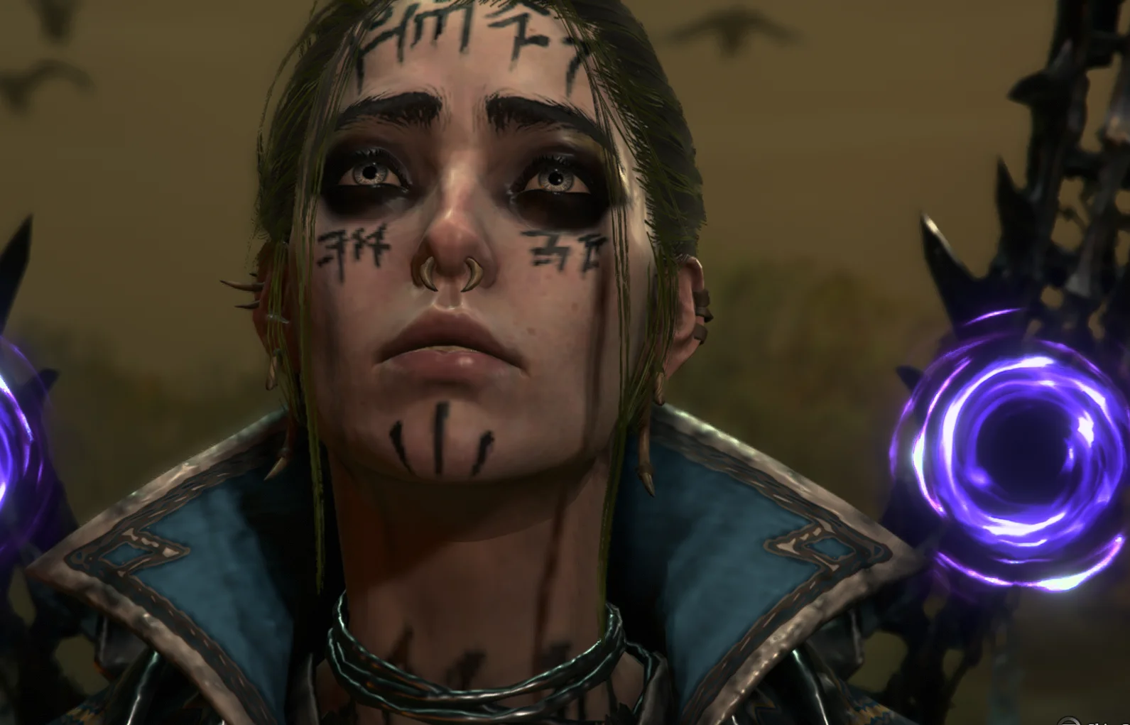 A screenshot from Diablo 4 of my Necromancer close-up with symbols tattooed on her face, tied back hair, dark makeup, and Xal'Atath's armor from WoW